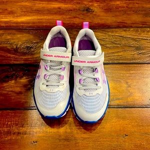Under Armour size 3 shoes.